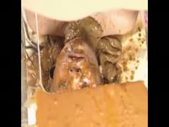 Japanese girl pooping on human toilet's face